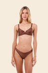 Woman wearing a brown bikini set 