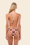 Woman wearing a patterned bikini set 